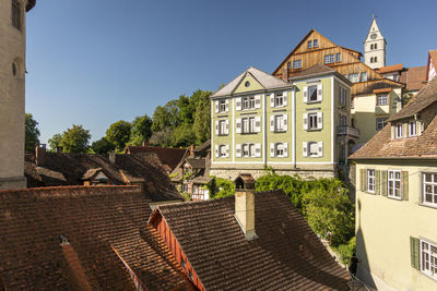 View across rooftops of the city of meersburg, germany