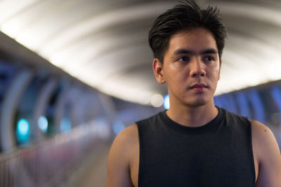 Close-up of young man looking away