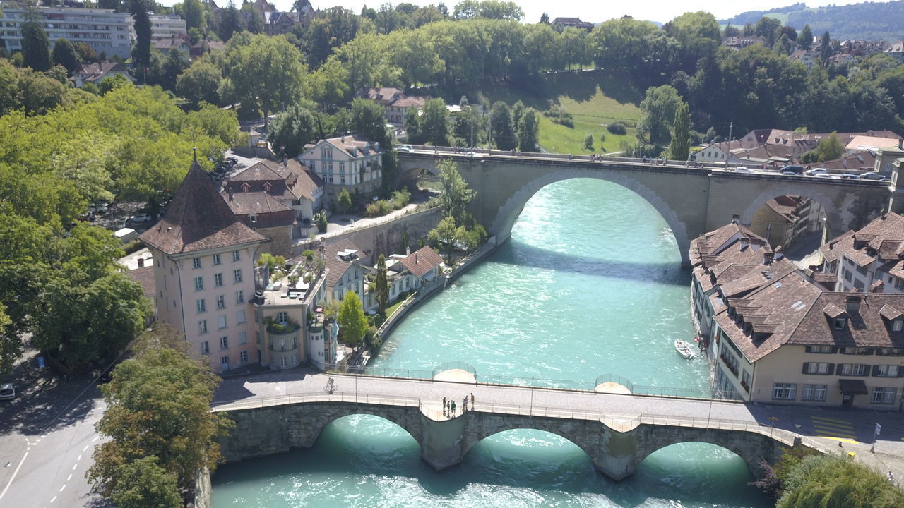 HIGH ANGLE VIEW OF DAM BY RIVER