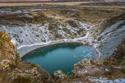 High angle view of water flowing through rocks