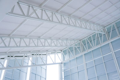 Low angle view of glass ceiling in building