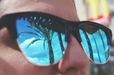 Close-up of woman wearing sunglasses