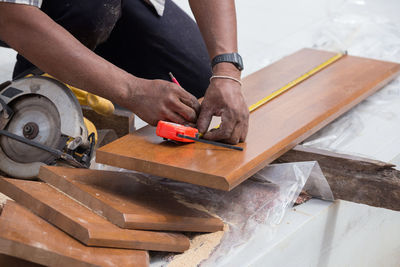 High angle view of man working on table