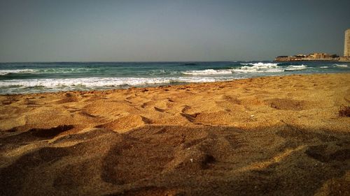 Scenic view of beach against sky