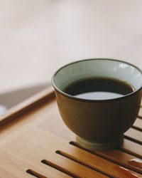 Close-up of tea cup on table