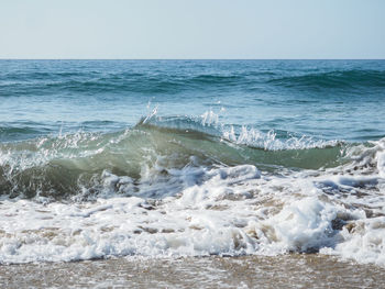 Scenic view of sea against clear sky