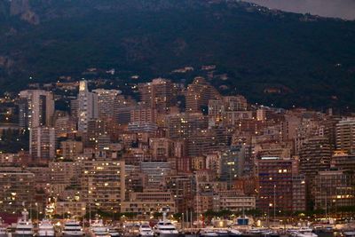 Aerial view of buildings in city at night