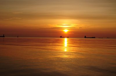 Scenic view of sea at sunset