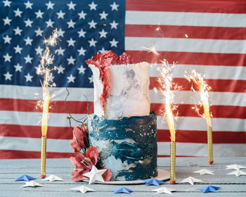 Close-up of flags on table