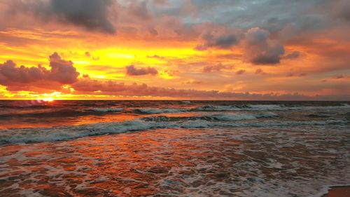 Scenic view of sea against sky during sunset