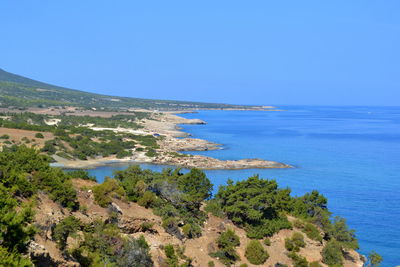 Scenic view of sea against clear blue sky