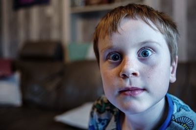 Close-up portrait of boy at home