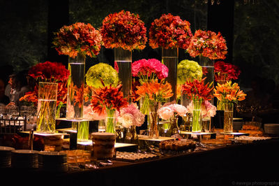 Flowers on table at night
