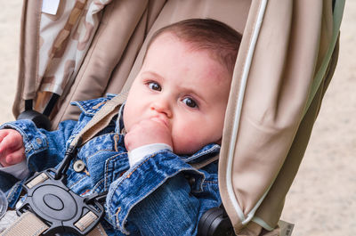 Portrait of baby in stroller