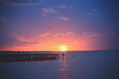 Scenic view of sunset over sea