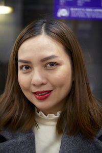 Portrait of smiling young woman