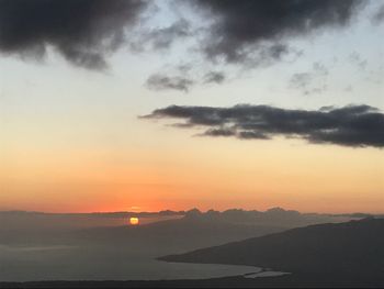 Scenic view of silhouette mountain against sky during sunset