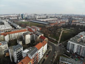 High angle view of buildings in city against sky