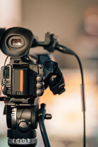 Close-up image of a camera at an outdoor press conference