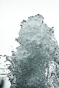 Close-up of water over black background