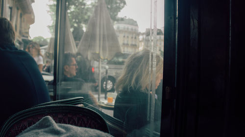 Woman sitting in train