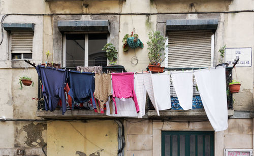 Clothes drying outside house