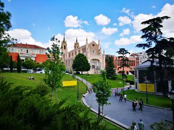 People at town square against sky