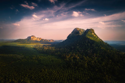 Scenic view of mountains against sky during sunset