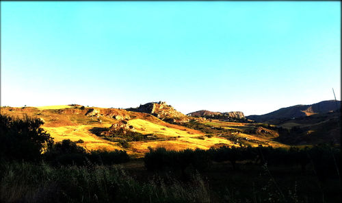 Scenic view of landscape against clear sky