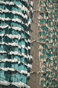 Low angle view of modern glass building