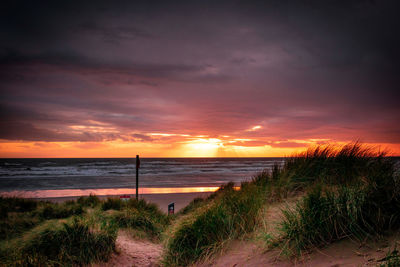 Scenic view of sea against sky during sunset