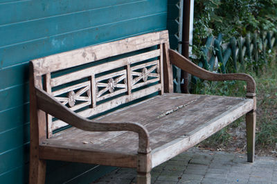 Old empty wooden bench in park