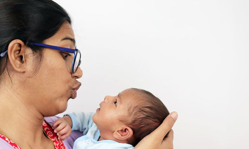 Portrait of mother with baby