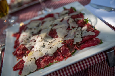 High angle view of carpaccio served in plate