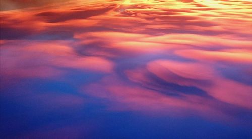 Low angle view of dramatic sky during sunset