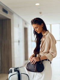 Young woman using mobile phone