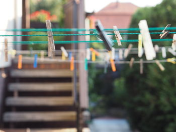 Close-up of clothespins on clothesline