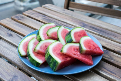 Close-up of watermelon slices in plate on table