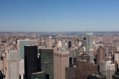 High angle view of buildings against clear sky