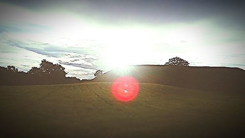 Sun shining through clouds