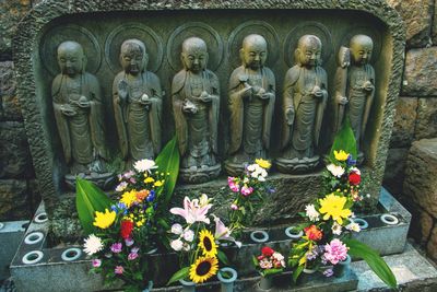 Buddha statue in front of building