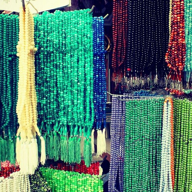multi colored, retail, variation, for sale, hanging, choice, abundance, indoors, textile, large group of objects, market, market stall, arrangement, store, in a row, shopping, fabric, collection, shop, clothing