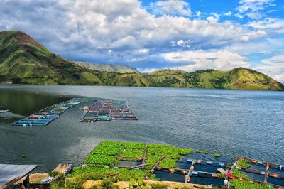 View of fish cages on lake toba indonesia with blue sky