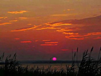 Scenic view of sunset over sea