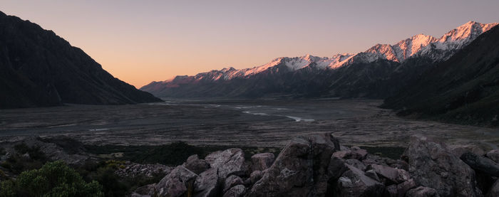 Scenic view of mountains against sky during sunset