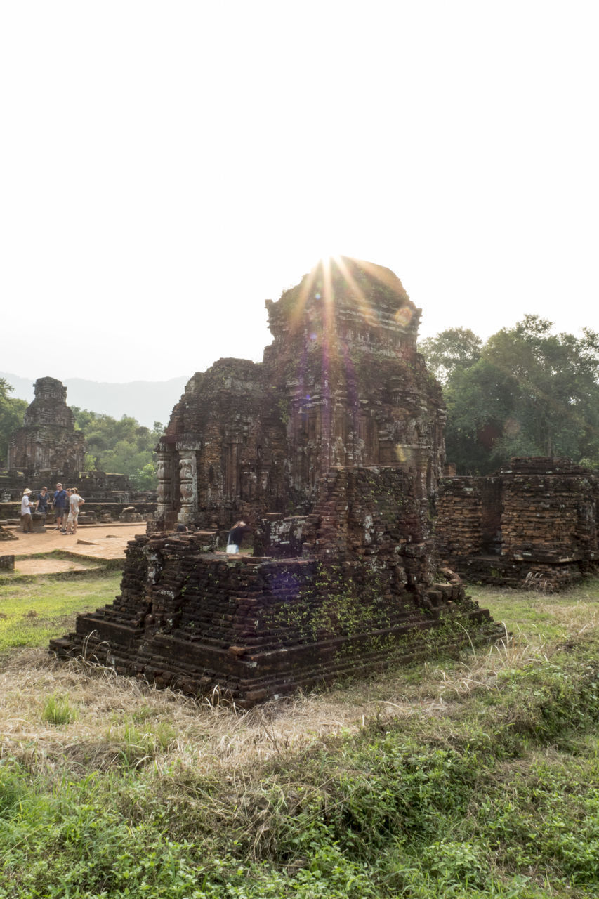 OLD TEMPLE AGAINST BUILDING