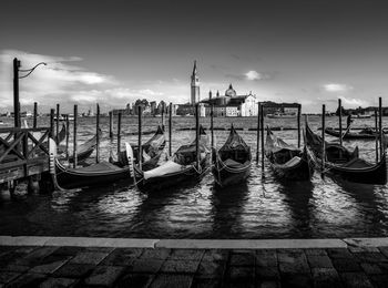 Boats moored in canal