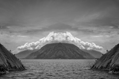 Scenic view of volcanic mountain against sky