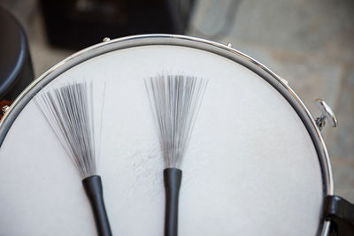 High angle view of paintbrushes on white table