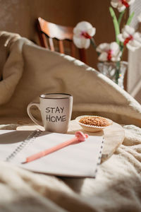 Close-up of coffee cup on table